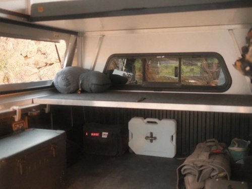 This Rugged, Hard-Shelled Truck Camper Elevates at the Push of a Button