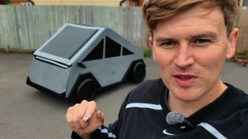 Tesla Employees React to Man Sleeping In Fake Cybertruck He Built Outside of Dealership
