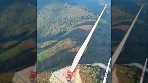 Truck Carrying 387-Foot Long Wind Turbine Blade Up A Mountain Looks Like The Most Stressful Work Day Ever