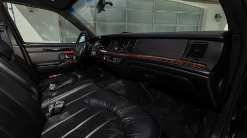 Lincoln, This Lincoln Town Car Hearse Has A Massive Golden Dragon On Its Roof... And It Could Be Yours