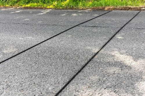 Those Mysterious Black Tubes on the Road Have an Important Job