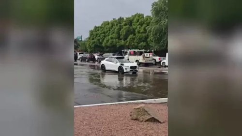 Video shows Waymo driverless vehicle stuck in 'AI loop' on flooded Phoenix street