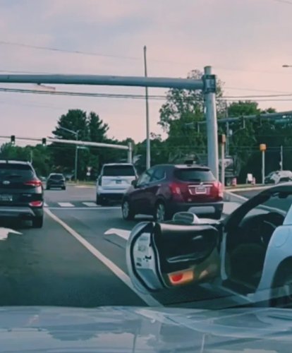 SUV, Corvette Driver Blocks SUV From Entering Traffic, Sparks Viral Debate Over Who Was Wrong