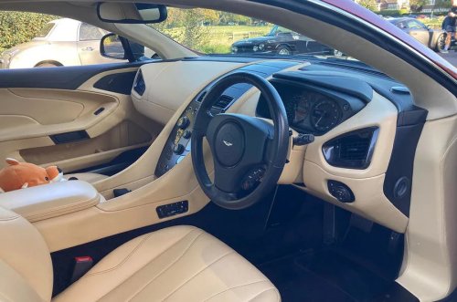 I arrived in the UK with a bike – now I own a £225k Aston