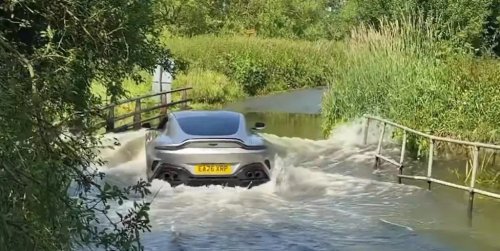 Aston Martin, SUV, Driver Learns an Expensive Lesson After Aston Martin Vantage Takes on Flooded Road Like an SUV
