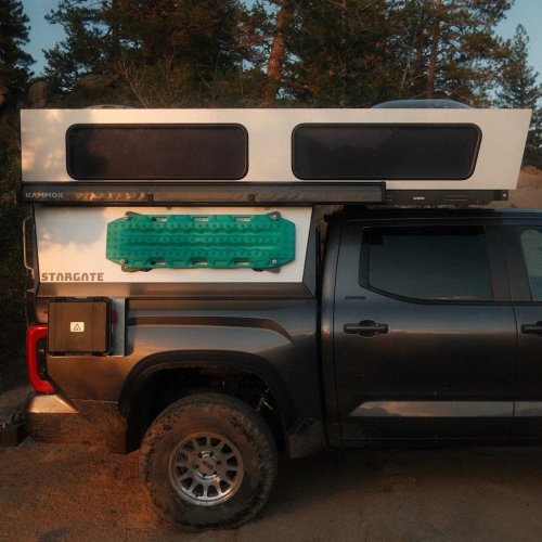 This Rugged, Hard-Shelled Truck Camper Elevates at the Push of a Button