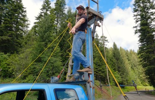 Man Builds a 19-Foot Tower on His Truck and Tries To Drive It With Ropes