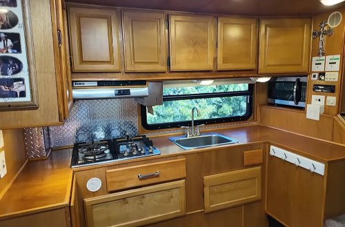 Ford, He Spent 6 Years Turning a Ford Truck Into a 30-Foot Diamond-Plated RV—and Now You Can Buy It