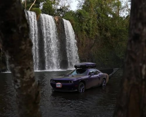 Dodge, Dodge Challenger, Man Showers at an F1 Circuit Using a Dodge Challenger's Trunk — There's Also a Stove on the Hood
