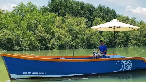 He Built a Full-Size Boat in His Yard—and Powered It With a Custom Hybrid Car Engine